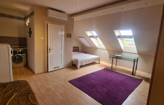 Eladó Tetőtéri társasházi lakás